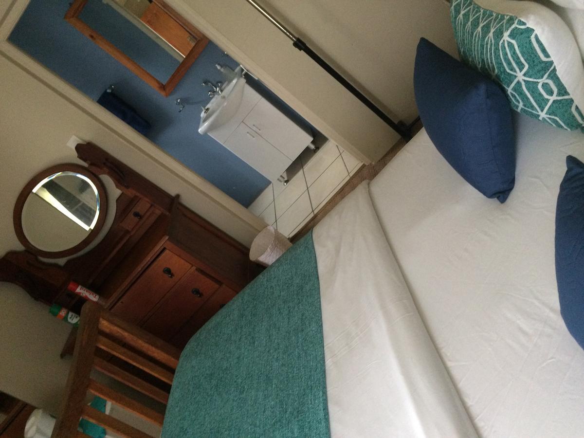 Breeze Inn Guesthouse Kiddʼs Beach Habitación foto